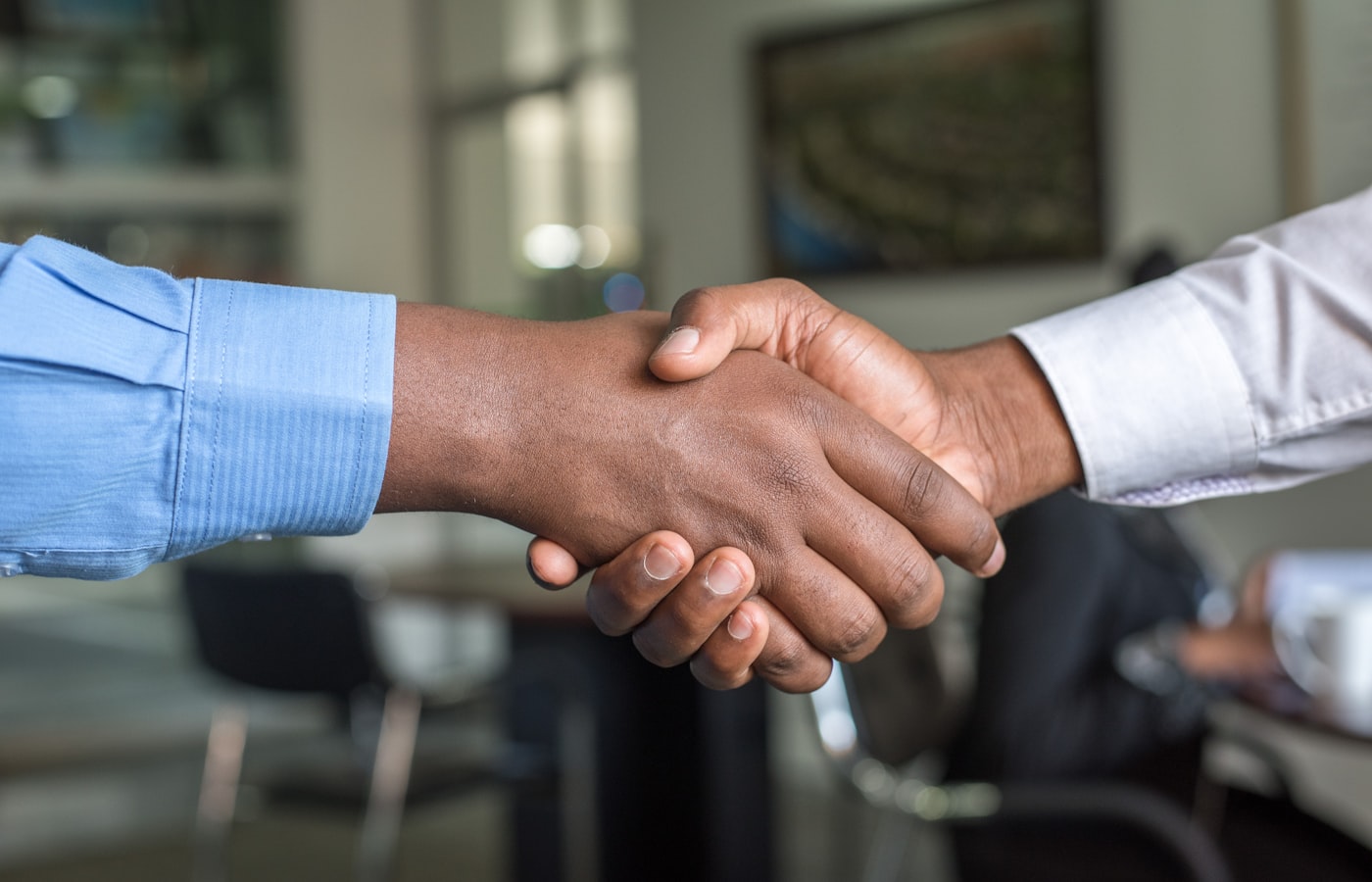 A professional handshake after completing probate